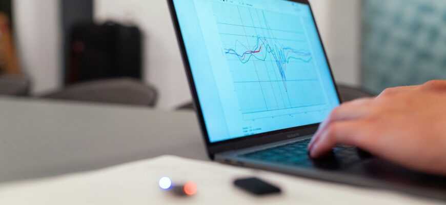 person using black laptop computer