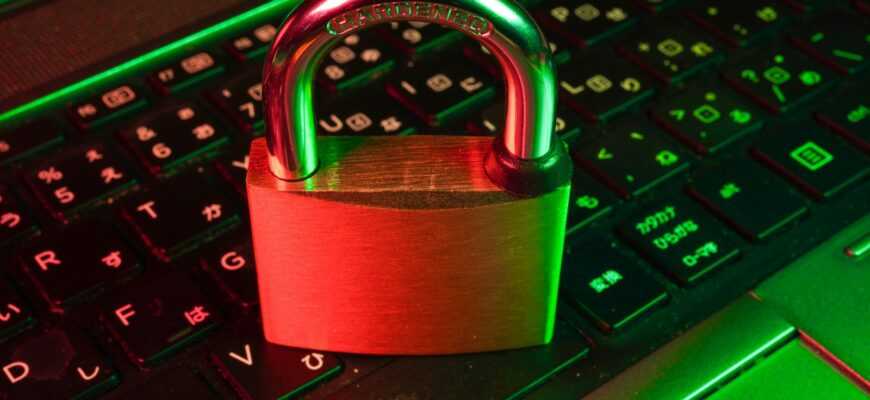 red padlock on black computer keyboard