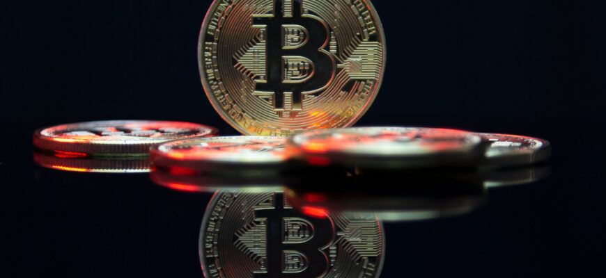 a bit coin sitting on top of a table